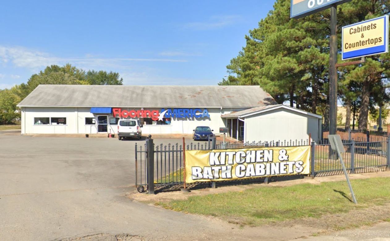 Arnold's Flooring America Showroom on I-30 Area Rug sale