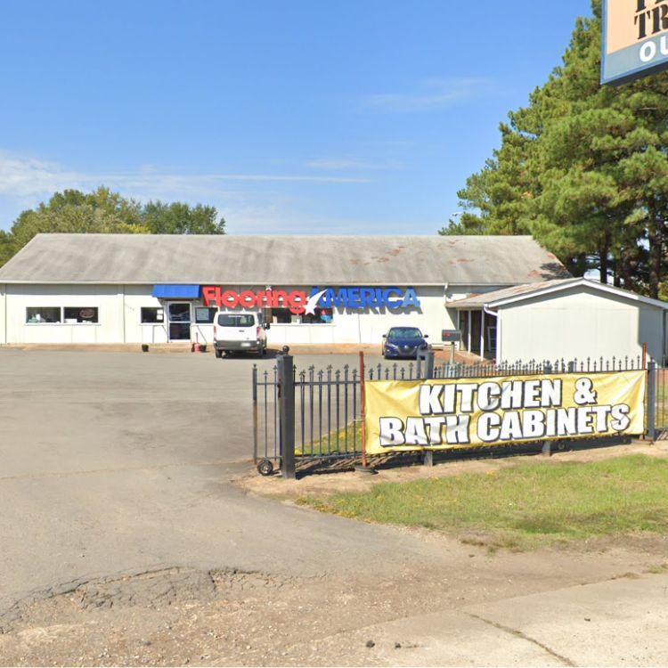 Arnold's Flooring America Showroom on I-30 Area Rug sale